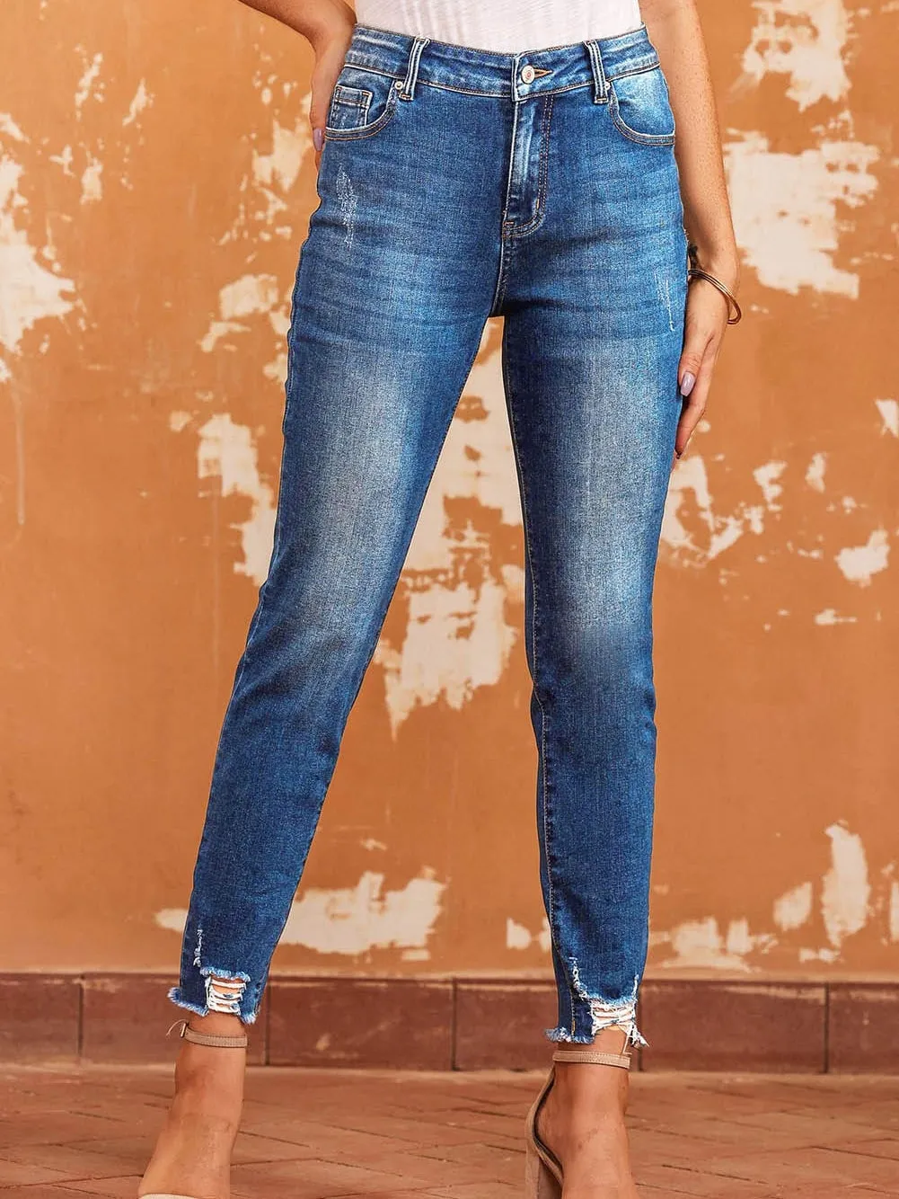 Blue Distressed Skinny Jeans with Raw Hem and Ankle-Length Cut