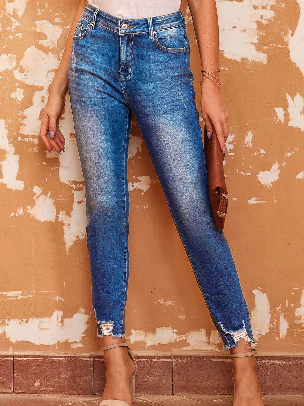 Blue Distressed Skinny Jeans with Raw Hem and Ankle-Length Cut