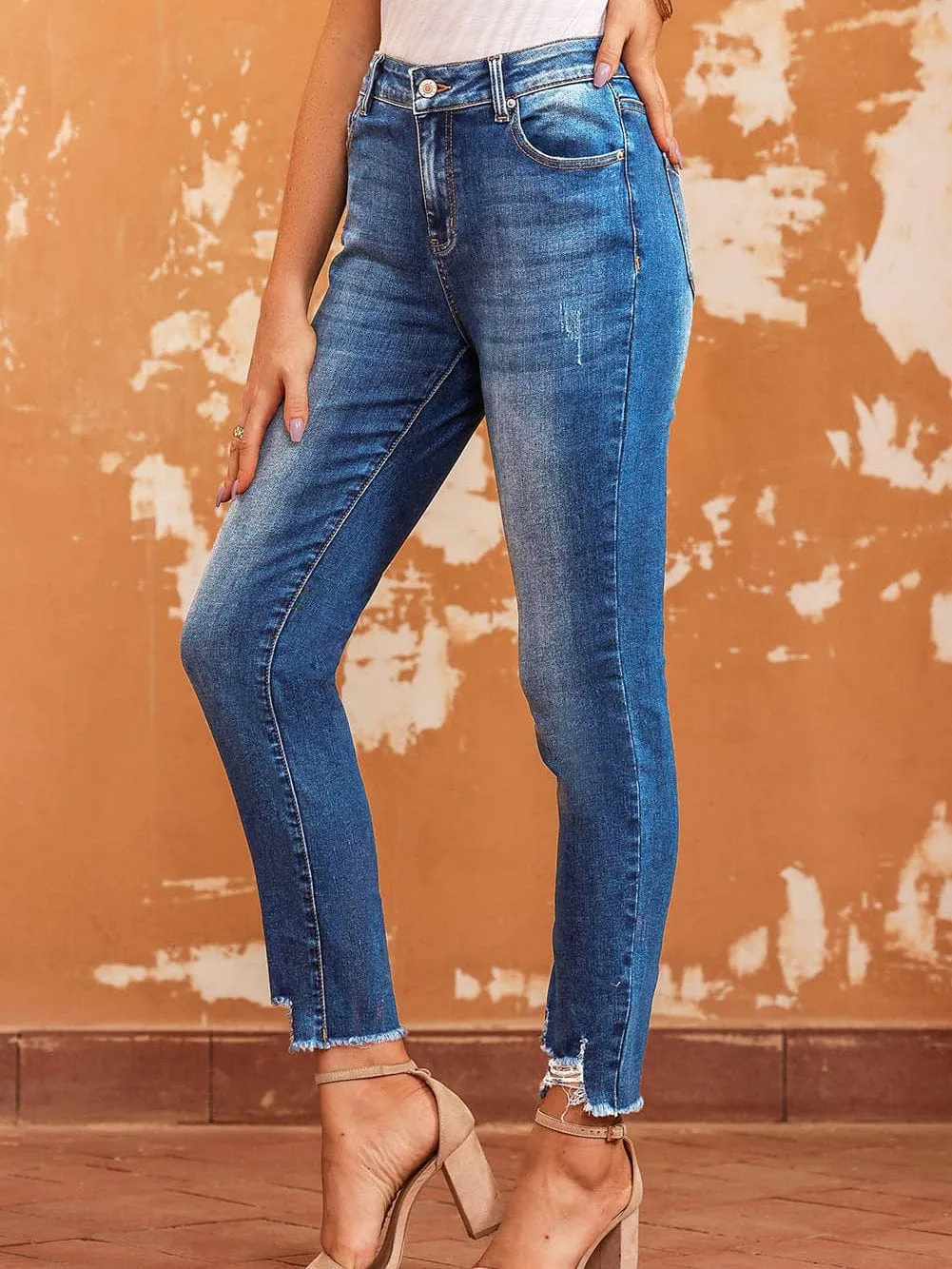 Blue Distressed Skinny Jeans with Raw Hem and Ankle-Length Cut