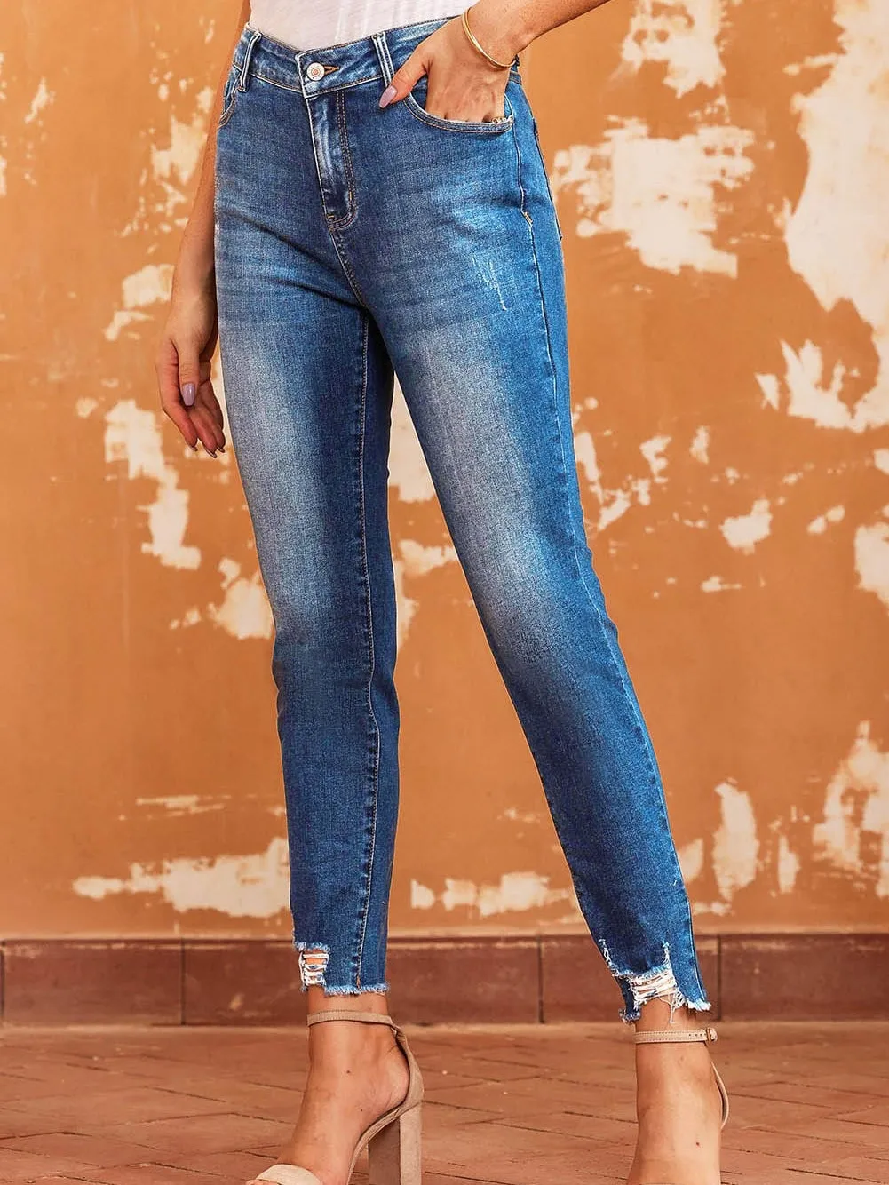 Blue Distressed Skinny Jeans with Raw Hem and Ankle-Length Cut