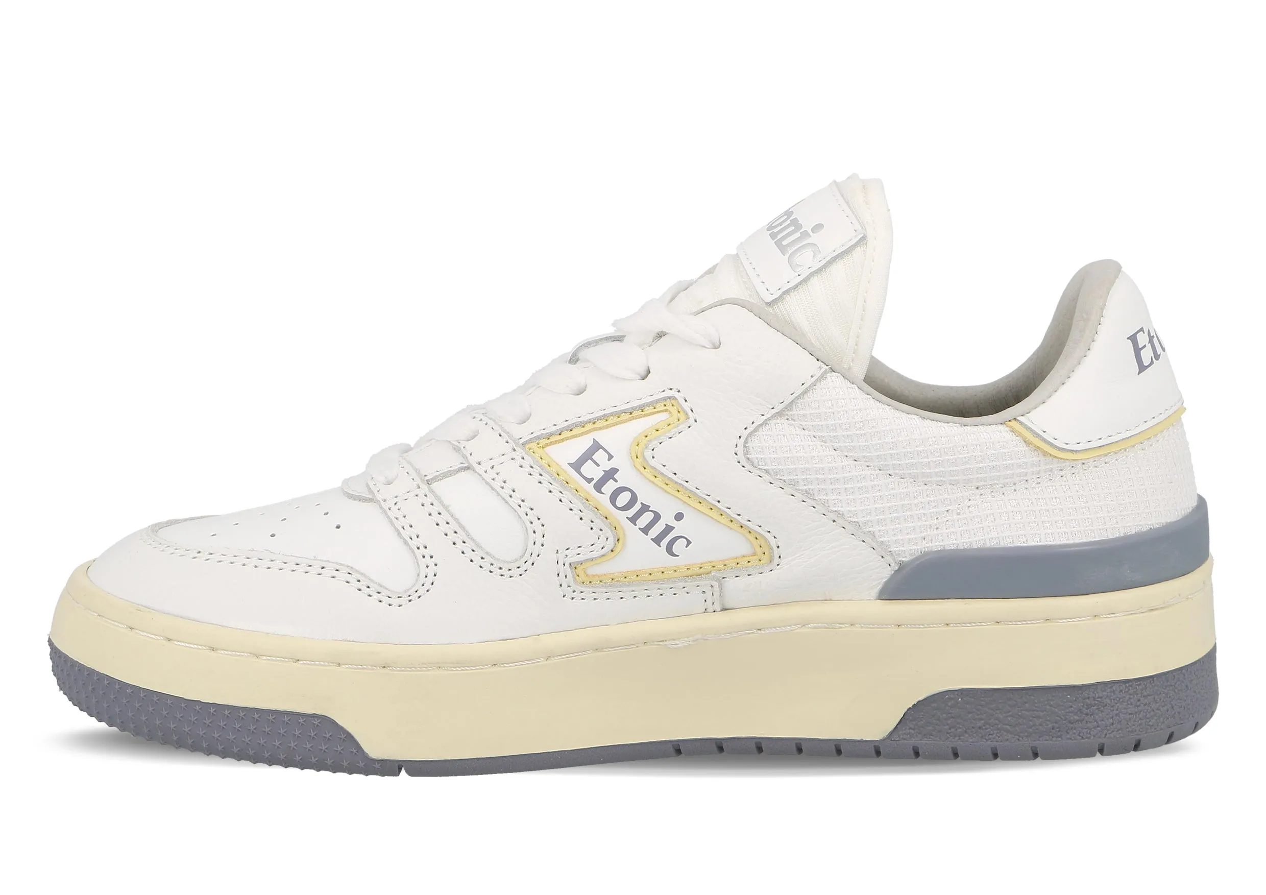 Etonic B481 sneakers in white leather, white mesh, yellow and smoke grey green details with beige midsole and smoke grey bottom outsole.