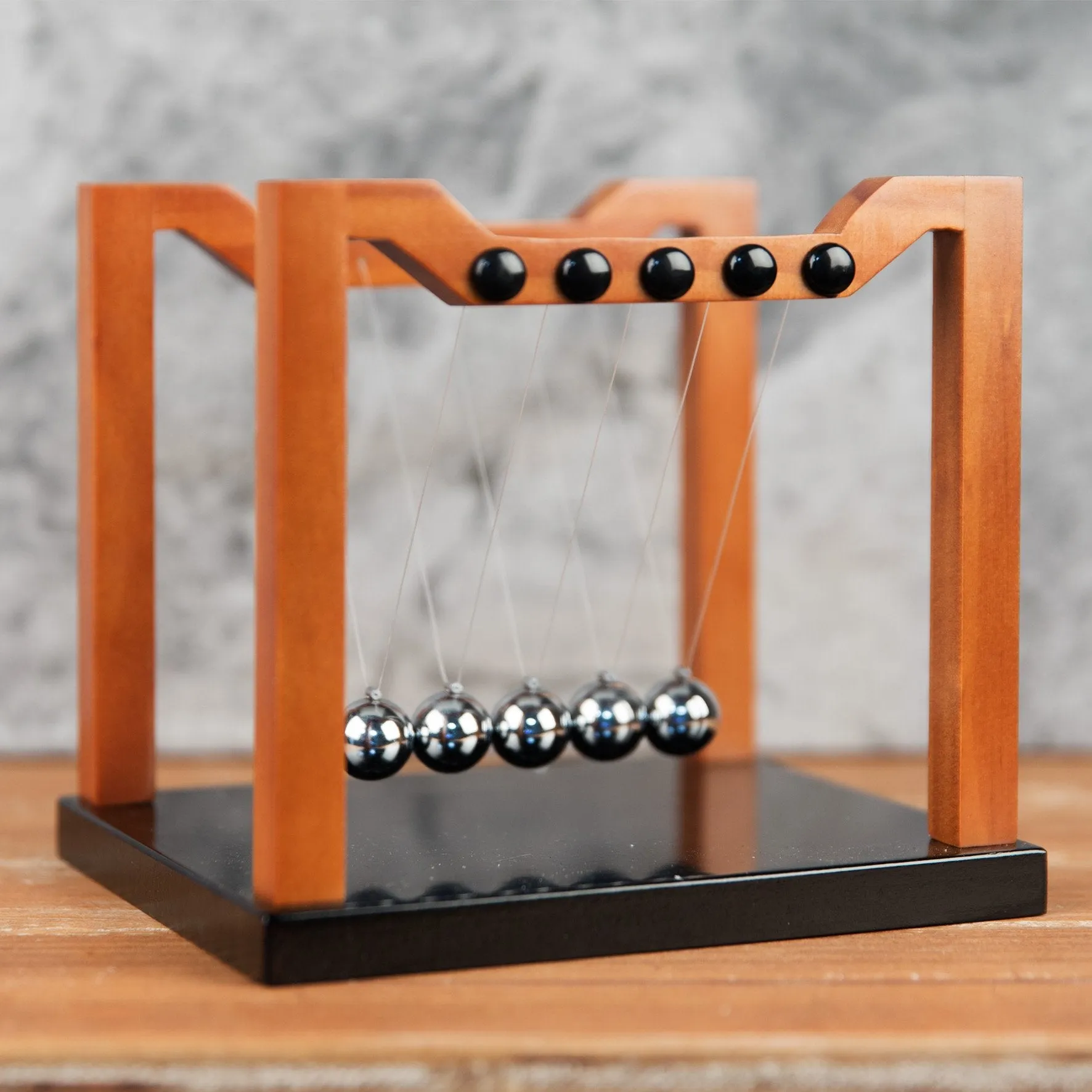 Harvey Makin Collection - Wood Effect Newtons Cradle 16 x 18cm